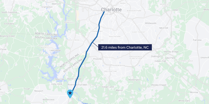 Map highlighting a route from Charlotte, NC, to a location 21.6 miles away, marked with a star icon. The map shows surrounding areas and highways in North Carolina and South Carolina.