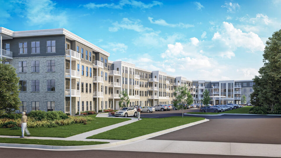 Rendering of a modern multi-story apartment building with brick and siding exterior, surrounded by landscaped greenery, parked cars, and a sidewalk. A person is walking in the foreground under a bright blue sky with scattered clouds.